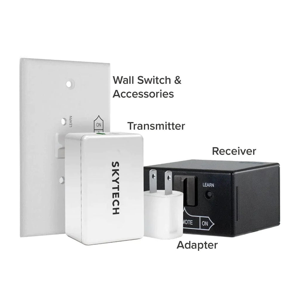 Fireplace remote kit with wall plate, white transmitter, adapter, and black receiver